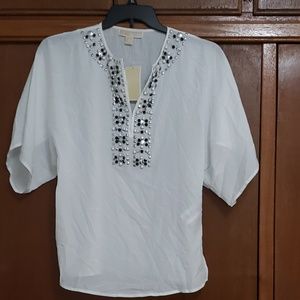 Mk blouse with embelishments.